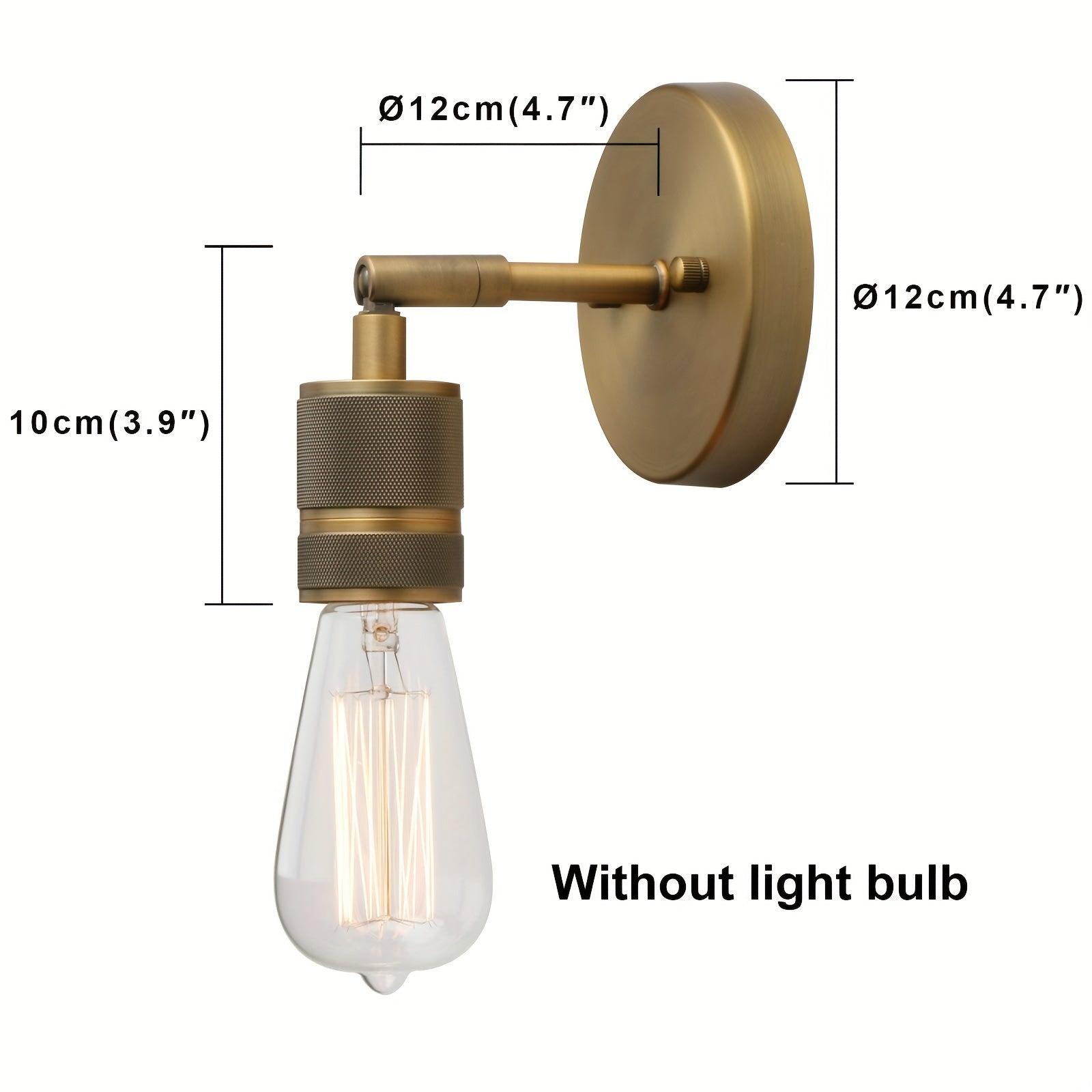 Antique bronze metal wall sconce for stylish kitchen lighting.