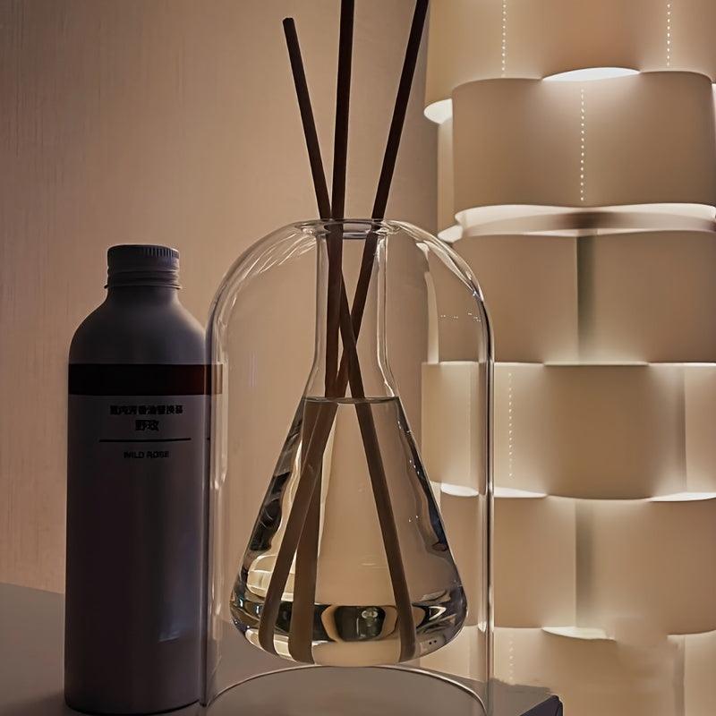 Aromatherapy reed diffuser vase in a cozy bedroom.