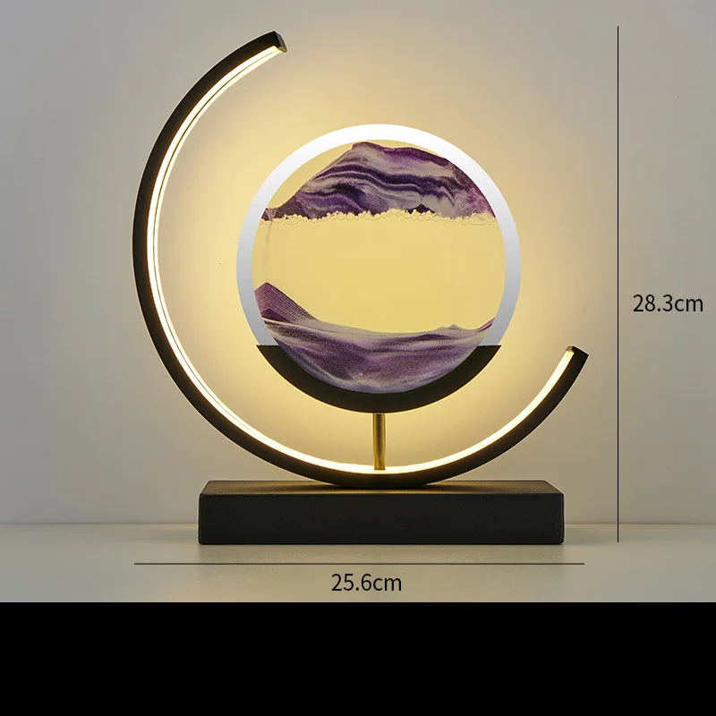 Adjustable brightness sand art desk lamp in minimalist home office setup.