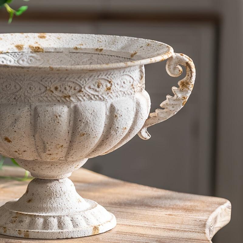 Cylinder-shaped metal vase for dried and fresh flower decor.