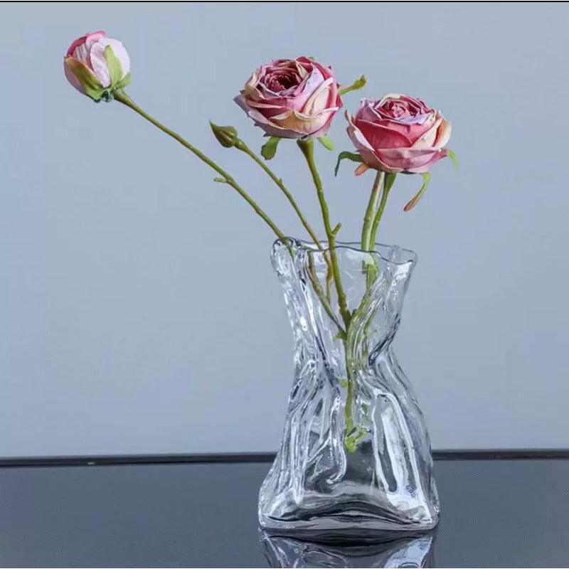 Minimalist glass vase ideal for contemporary and vintage home themes.