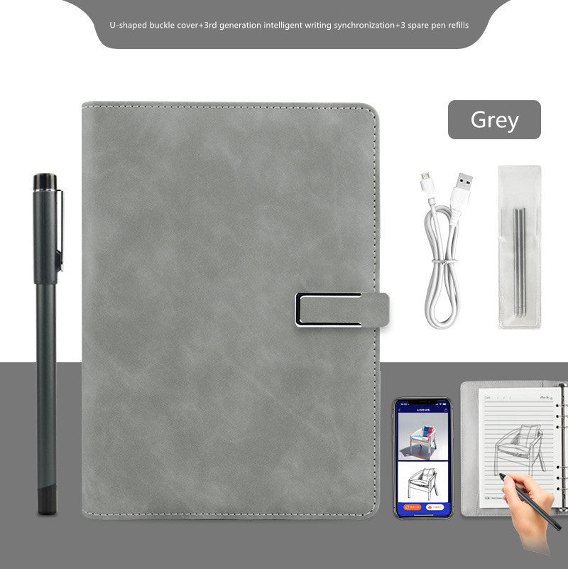 Gray notebook with pen, cable, and other accessories on a white background