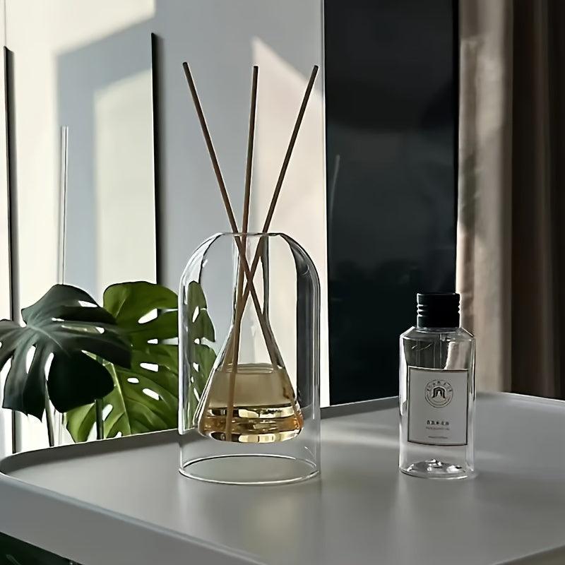Elegant glass vase with dried flowers for minimalist home decor.