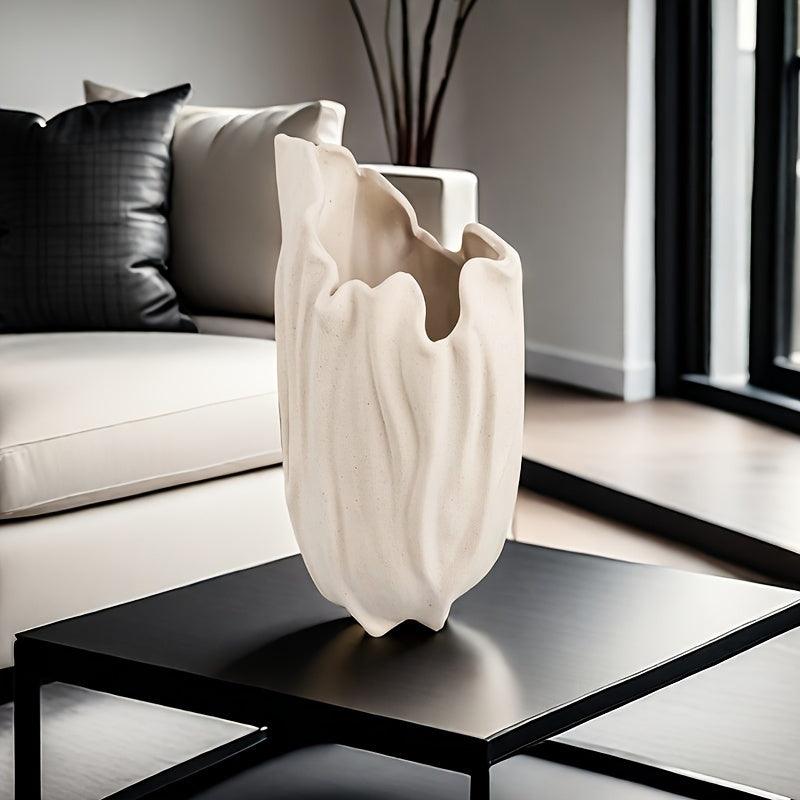 White ceramic vase for elegant flower arrangements and modern decor.