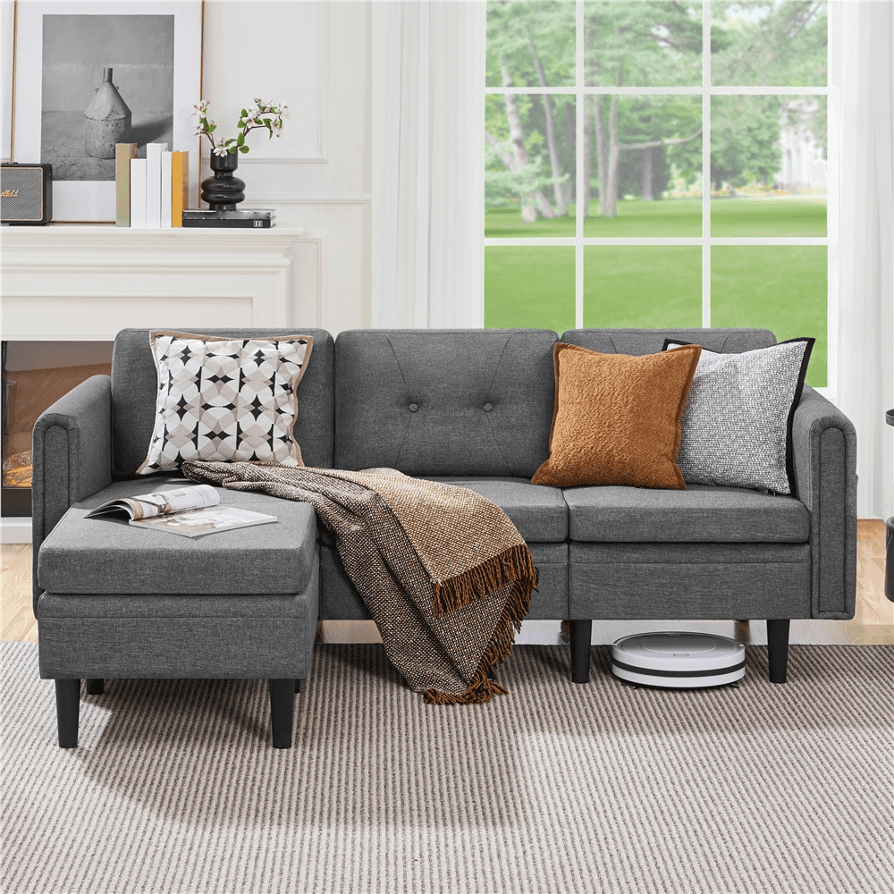 Free-moving ottoman paired with a stylish L-shaped sofa.