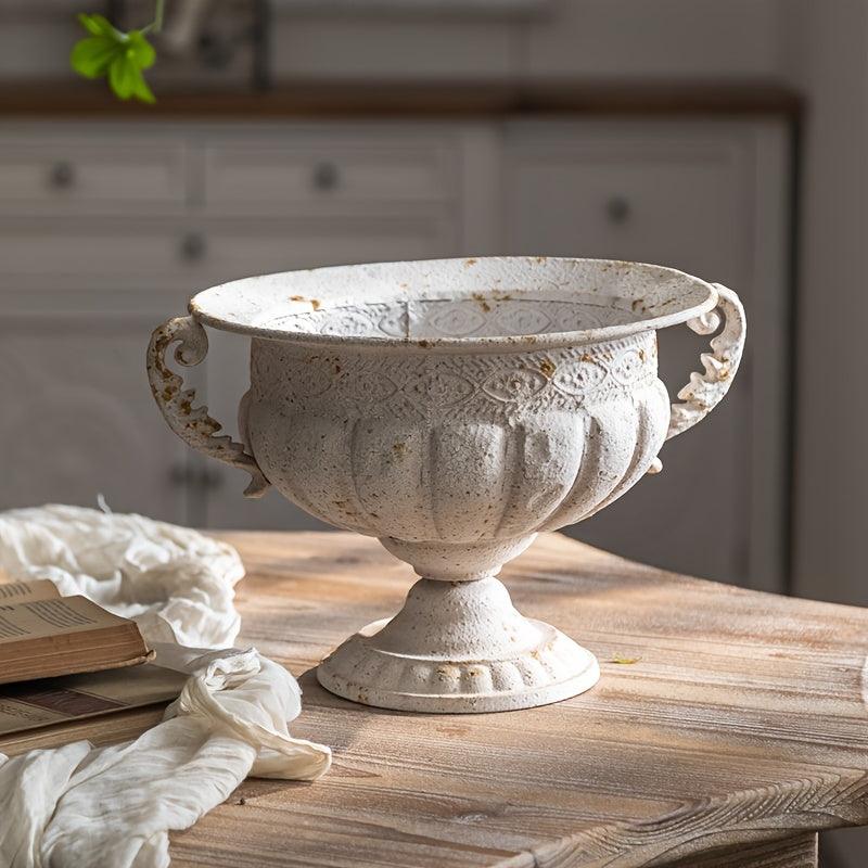 Romantic trophy-shaped flower vase for rustic home styling.