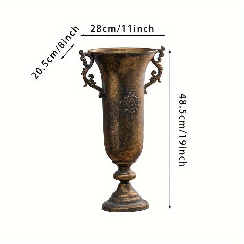Dual-handled vase for wedding and event floral displays.
