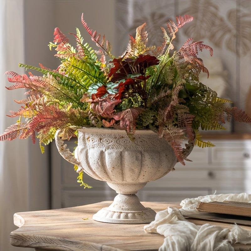 Rustic flower vase with floral patterns for home interiors.