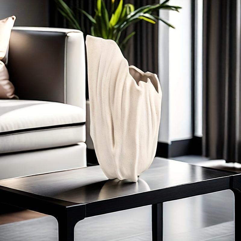 Sleek white vase for artistic arrangements in modern homes.