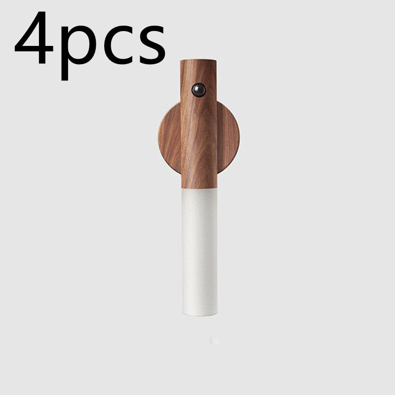 Wooden and white wall hook on a light gray background with &