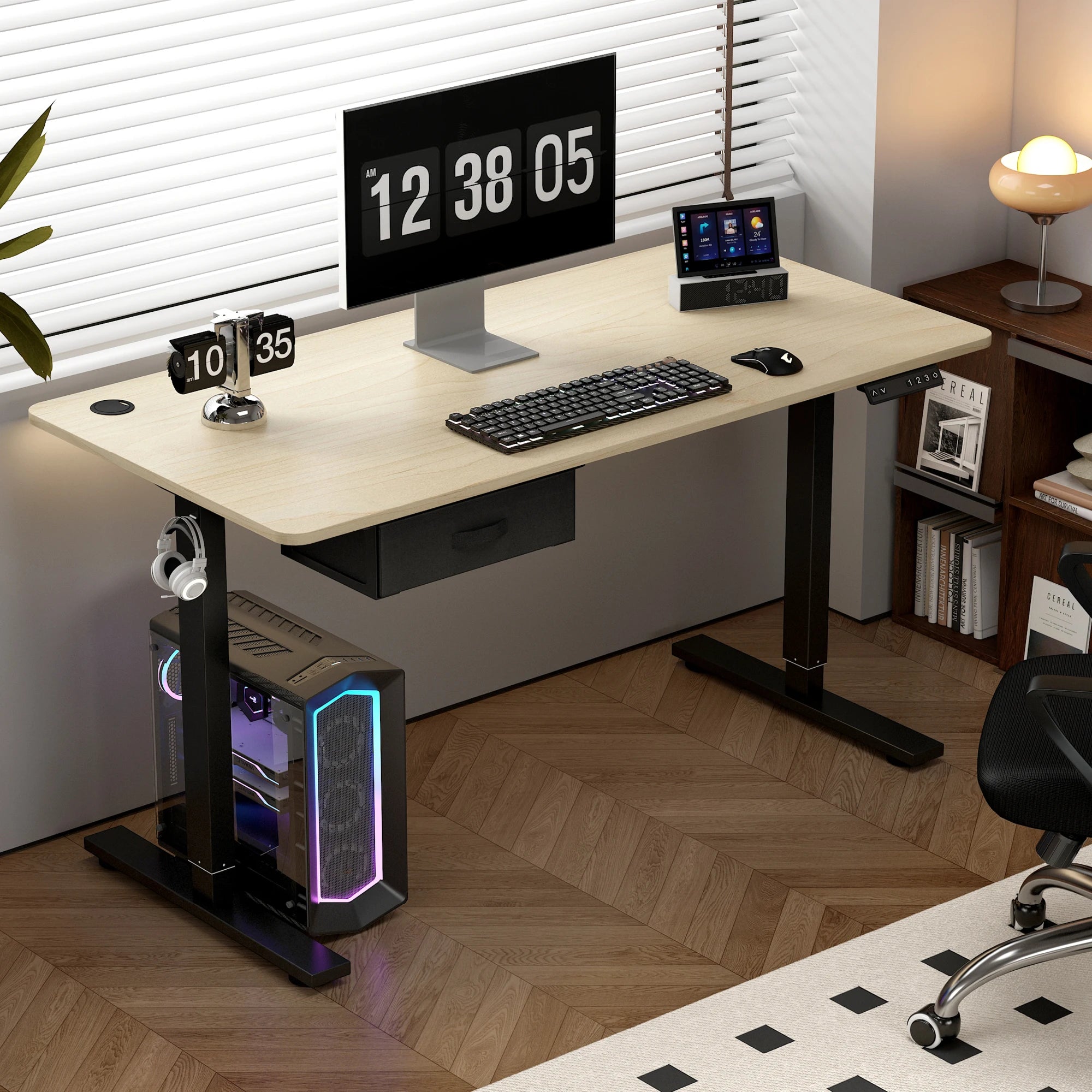 Modern office setup featuring height adjustable electric desk.