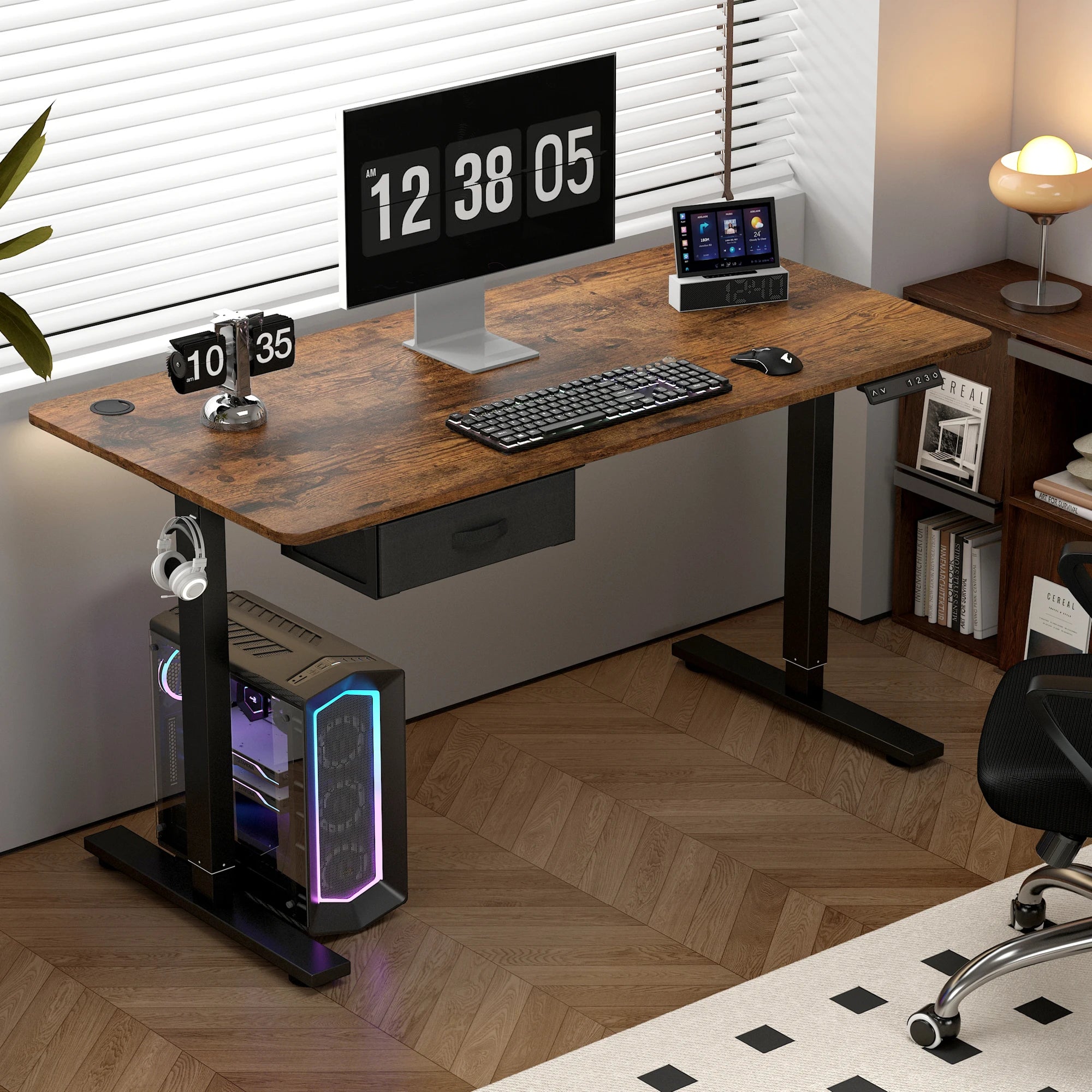 Height adjustable electric standing desk with USB charging port and drawer.