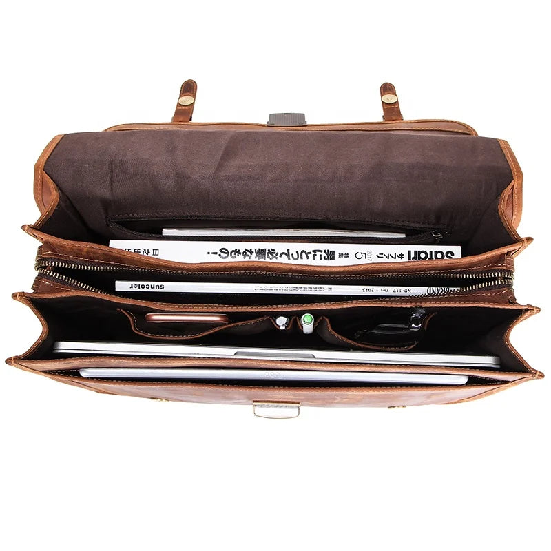 Bag shown with documents, phone, and cables inside