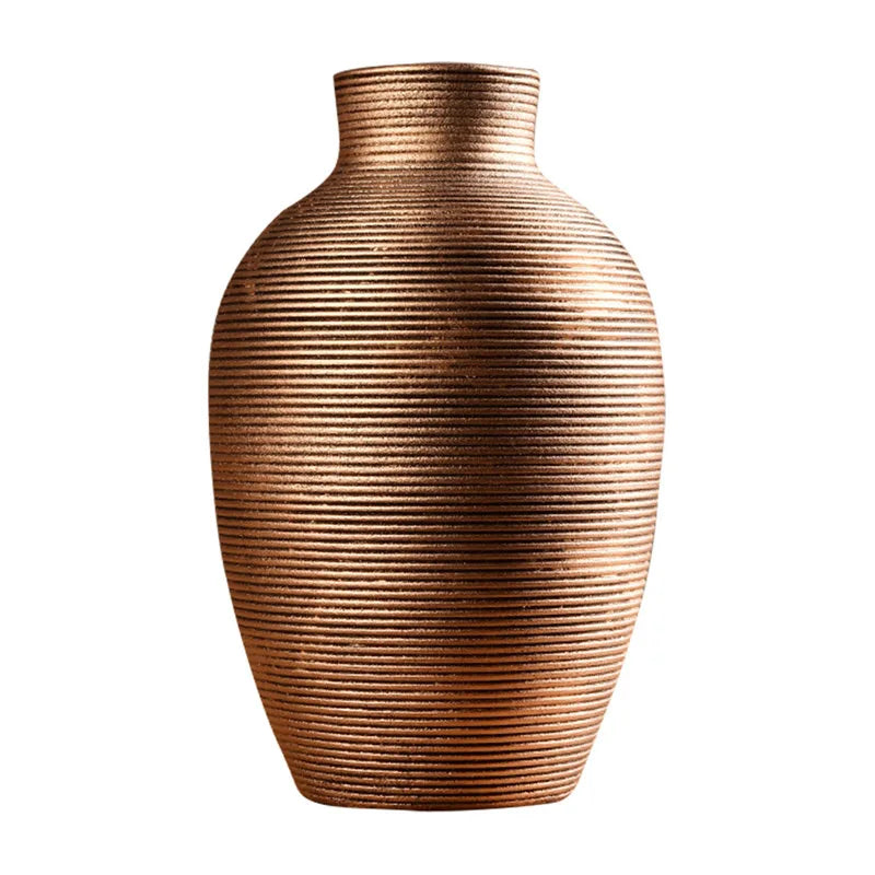 Bronze ribbed vase on a white background