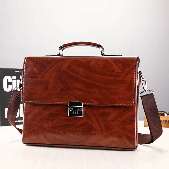 Brown leather briefcase with a textured pattern on a white background