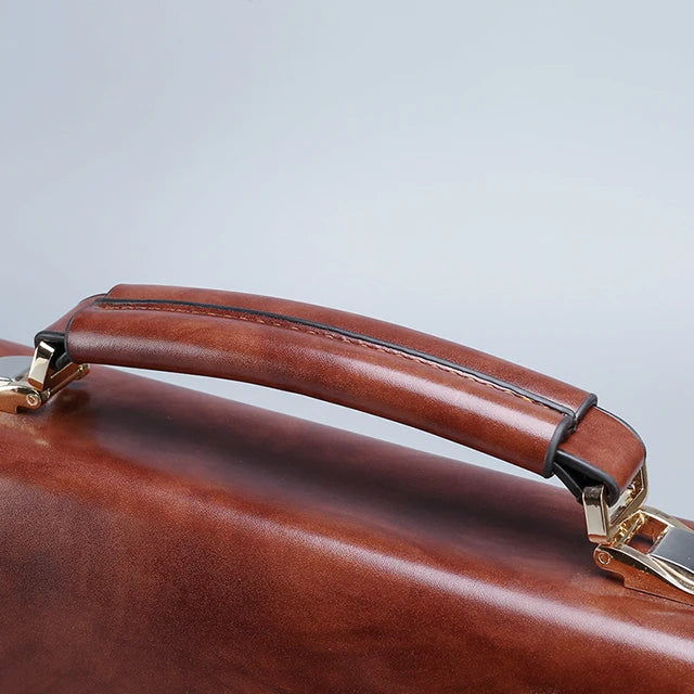 Light brown leather briefcase with secure code lock and top handle
