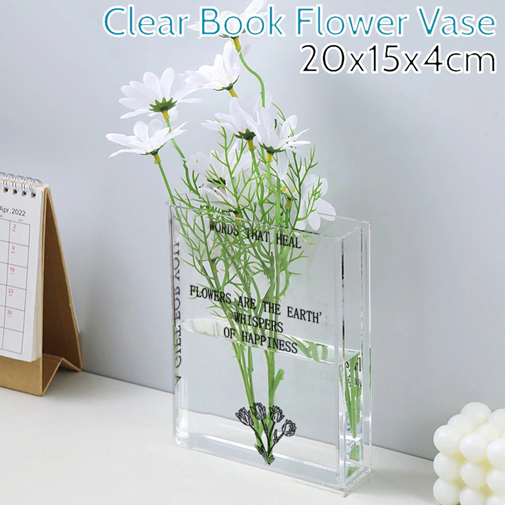 Clear book flower vase with white flowers on a light gray background