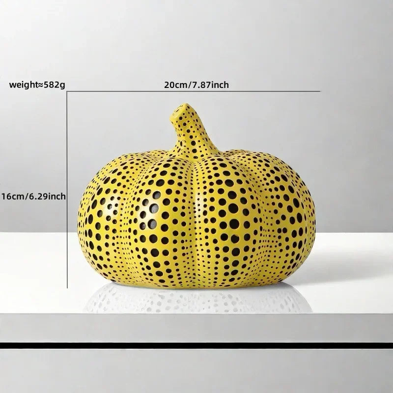 "Decorative pumpkin statue as a thoughtful housewarming gift