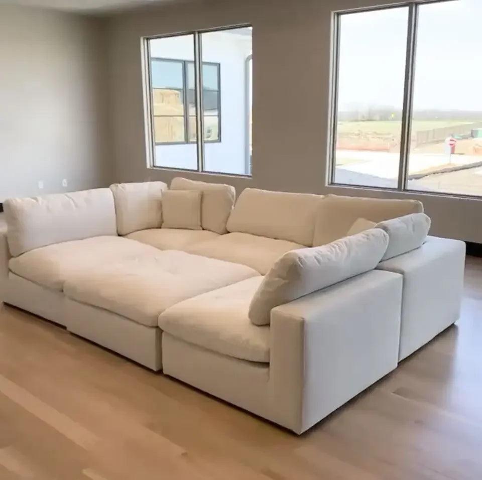 Minimalist sectional couch with chaise and durable fabric.