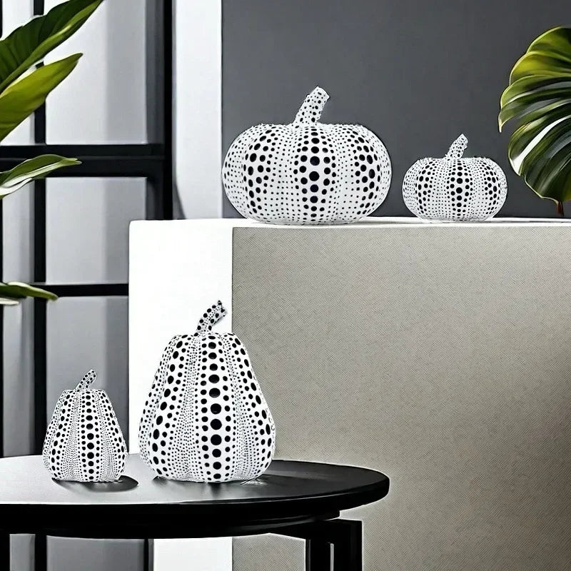 "Modern pumpkin statue on a living room table with elegant decor accents"