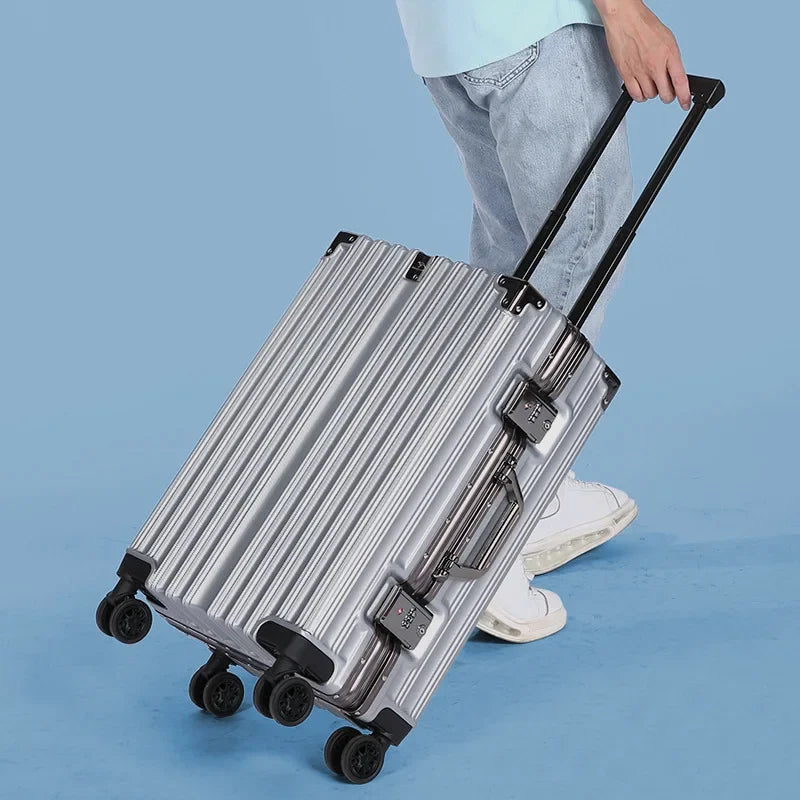Yellow cabin trolley suitcase with 360° caster wheels and ergonomic handle.