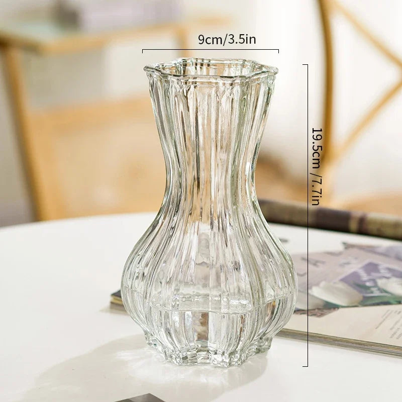 Clear glass vase with dimensions on a blurred background
