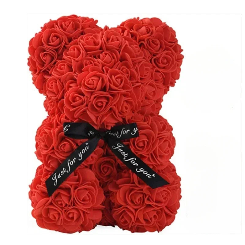 Charming teddy bear covered in preserved roses