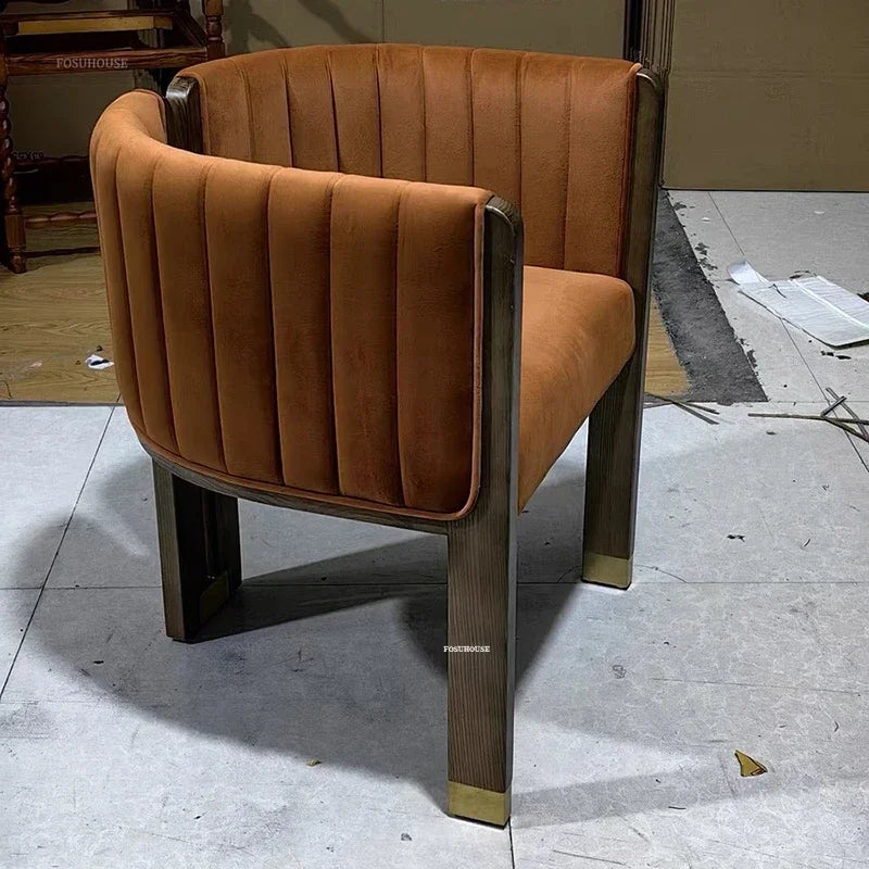 Comfortable fabric upholstered dining chair with supportive backrest and durable wood frame.