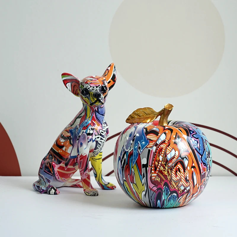 "Unique graffiti-style apple figurine for tabletop decoration"