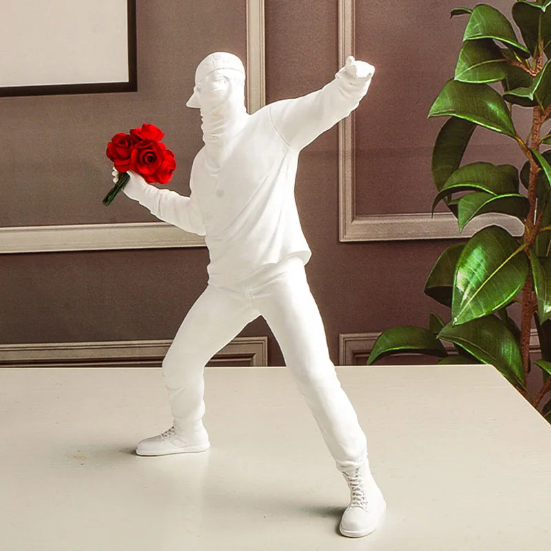 "Banksy-inspired flower bomber sculpture for office interiors"