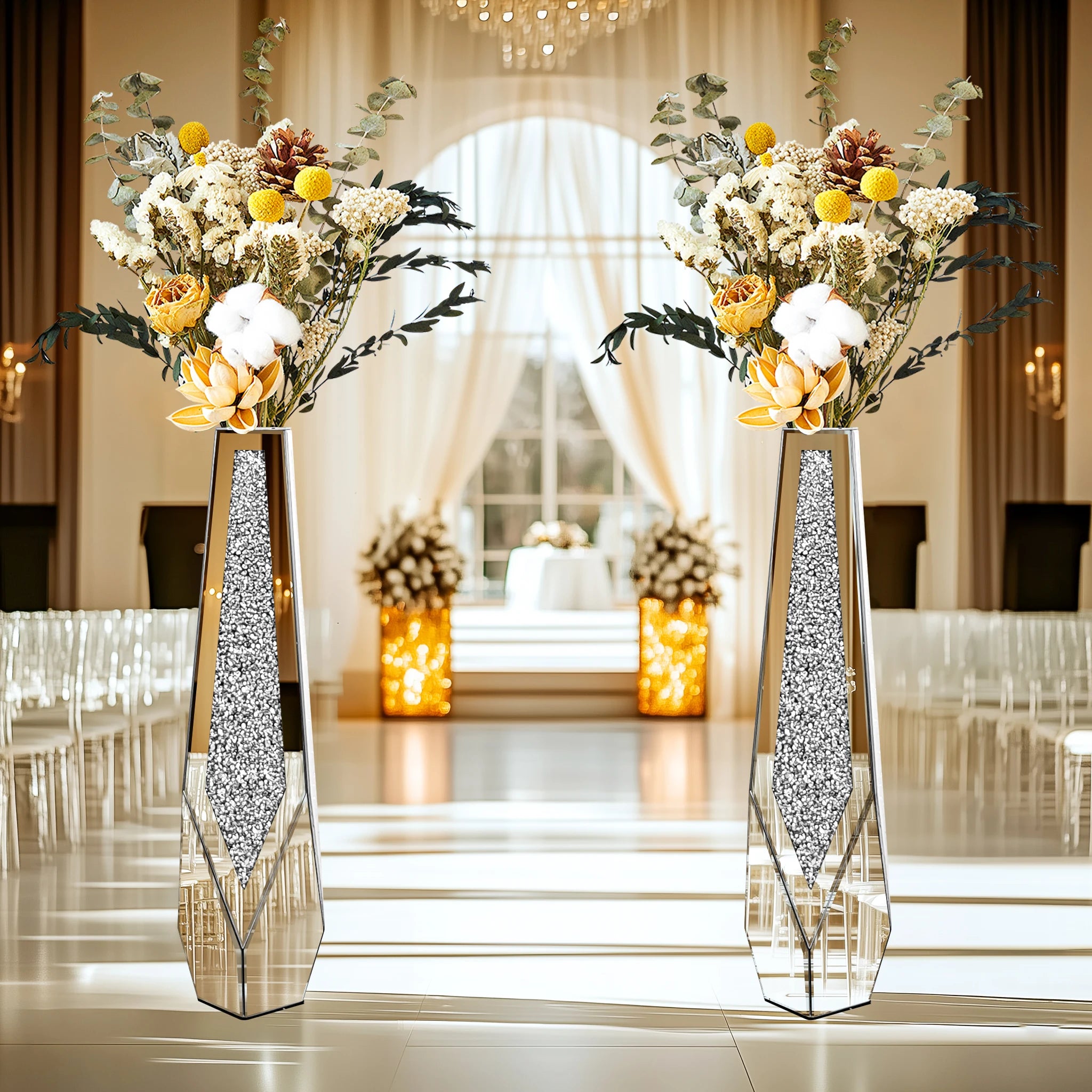 Decorative vases with floral arrangements in a formal event setting.