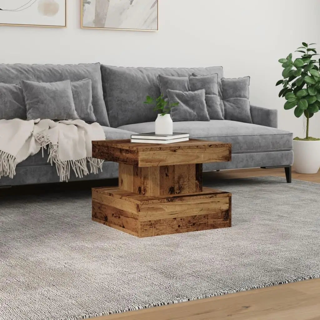 Gray sofa with a wooden coffee table in a living room setting