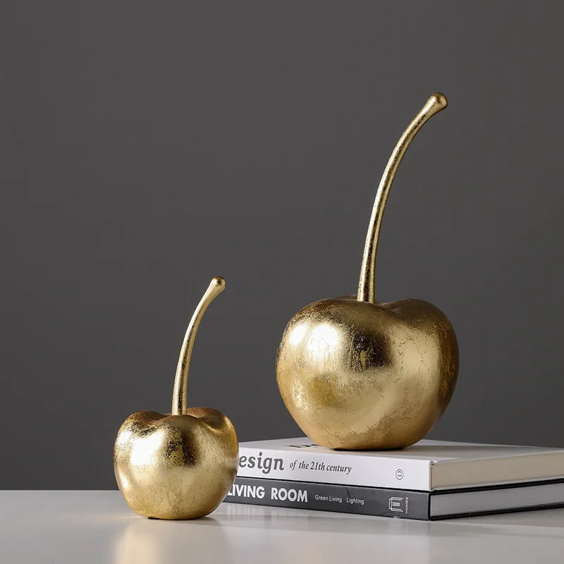 "Minimalist cherry sculpture on an office desk"