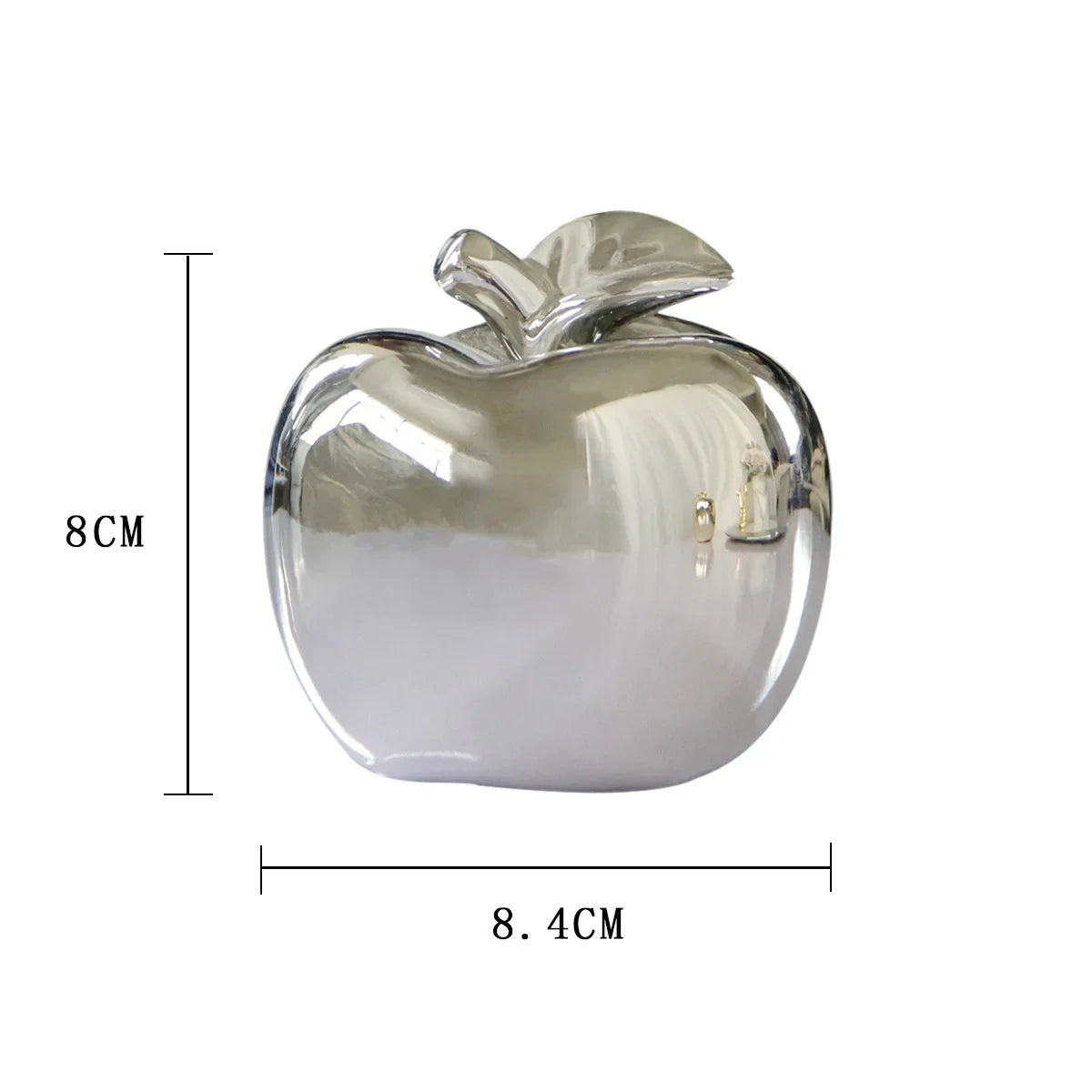 "Plated gold apple ceramic statue enhancing a Nordic-themed interior"