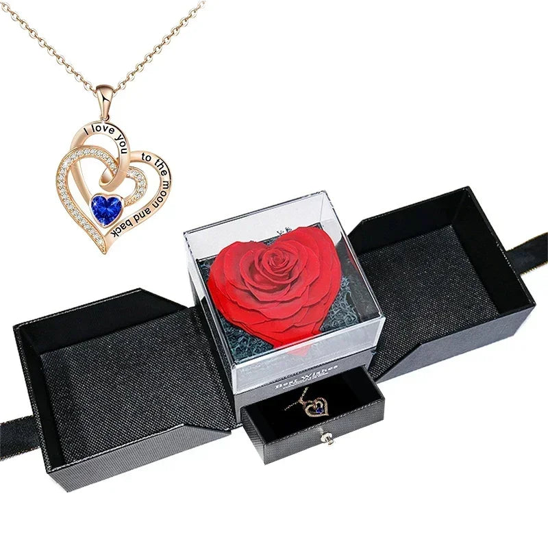 The rose jewelry box displayed open, showcasing both the rose and necklace.