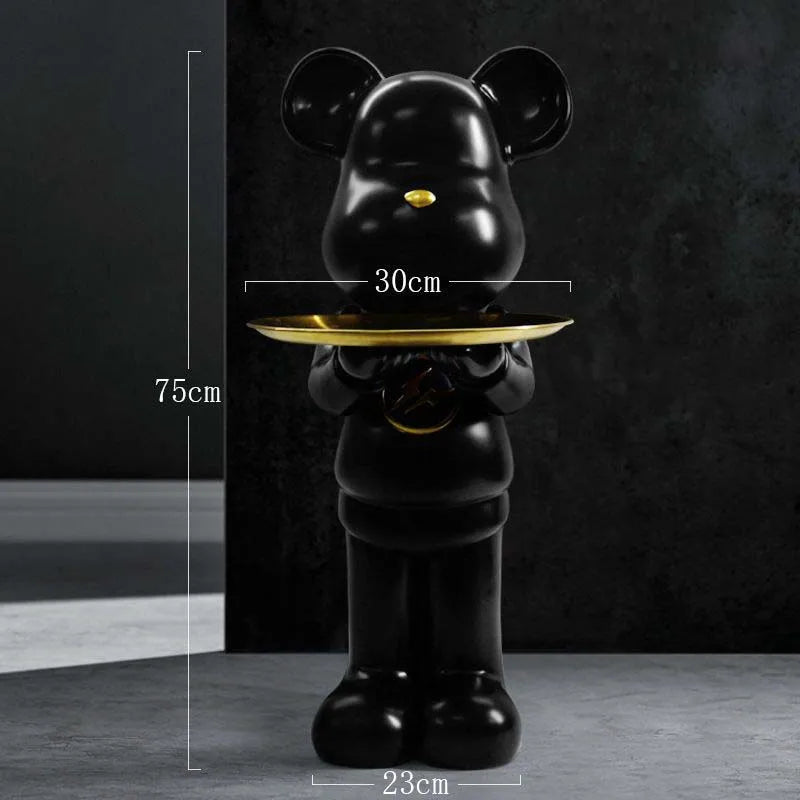 The resin bear sculpture displayed against a minimalist background