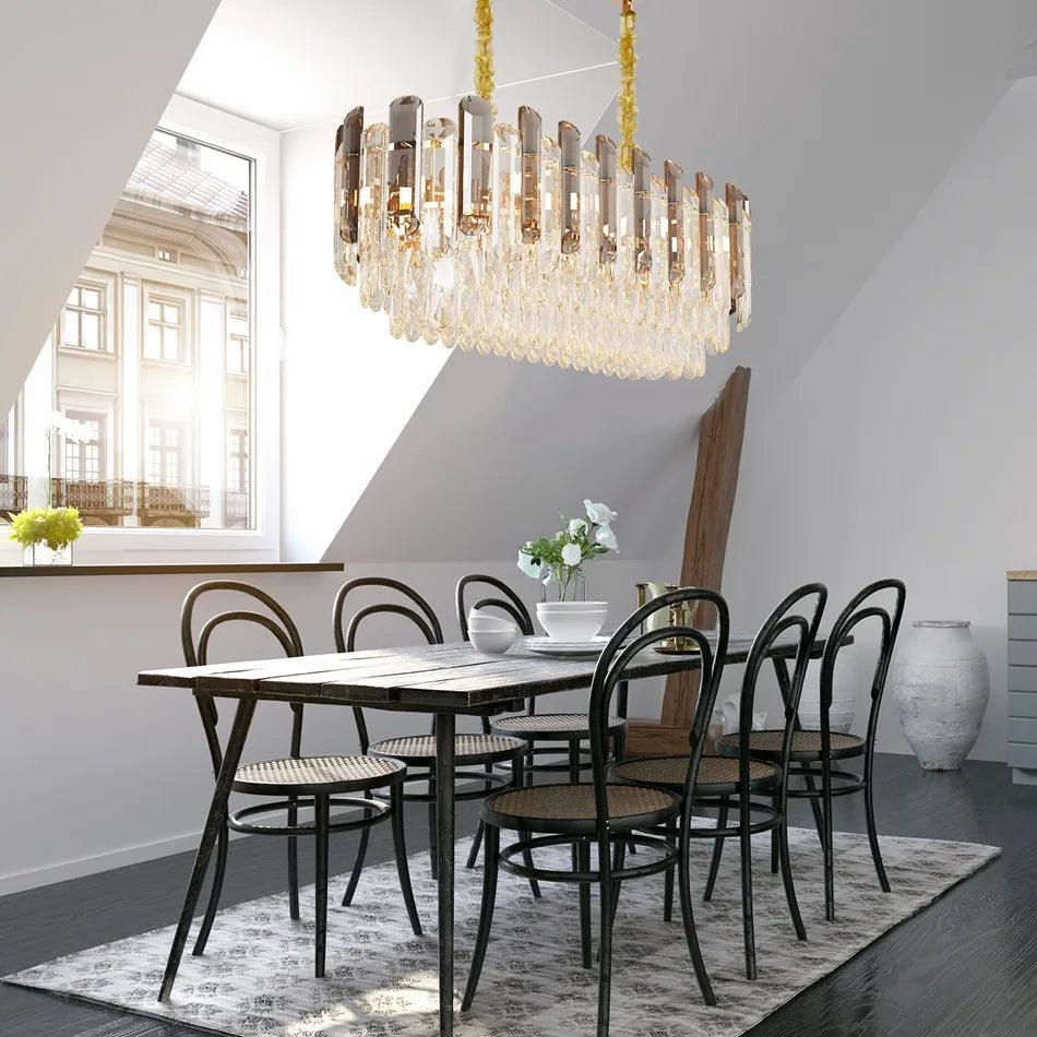 Elegant crystal pendant chandelier with adjustable height, perfect for high-ceilinged living rooms and foyers.
