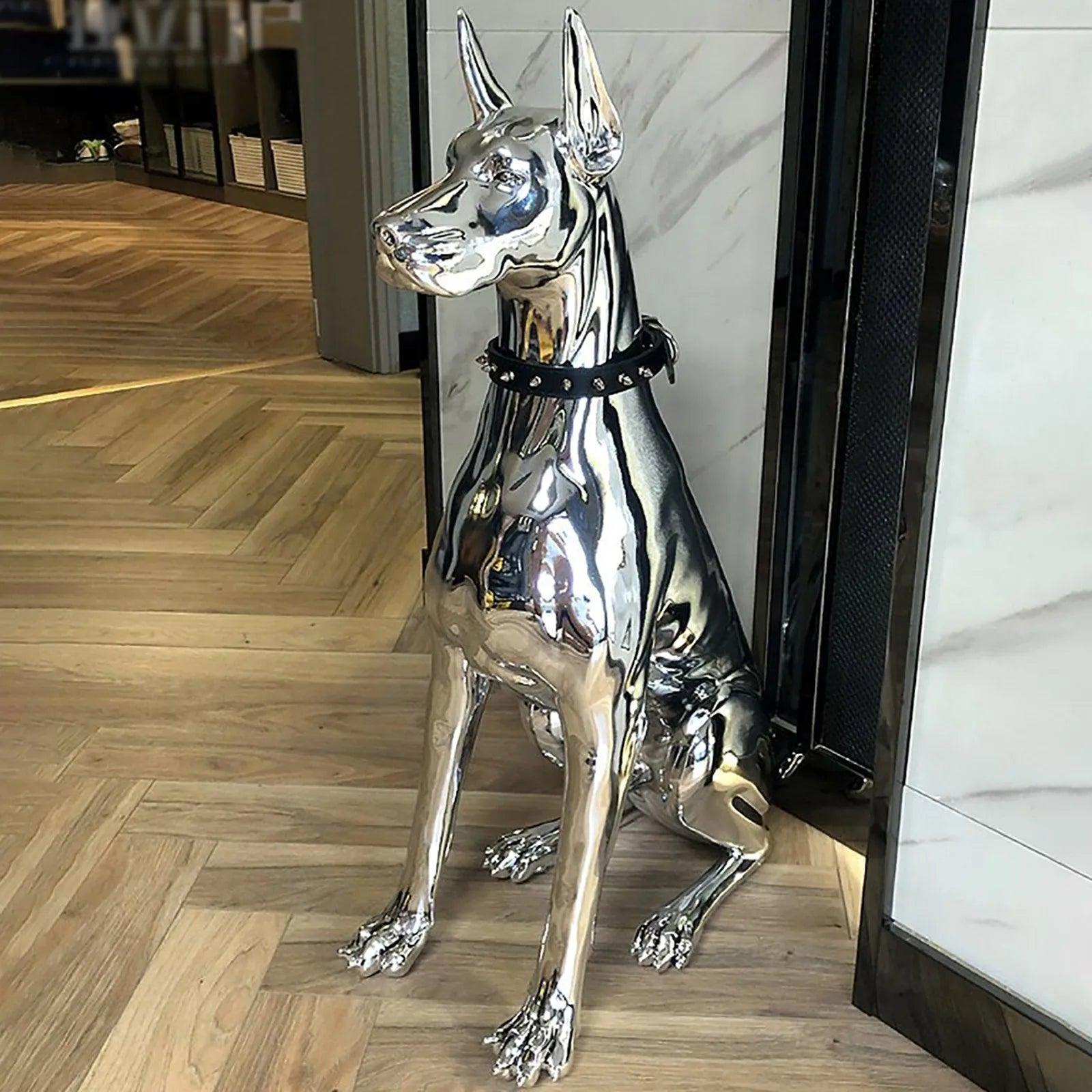 Front view of Doberman dog sculpture on a modern desk.