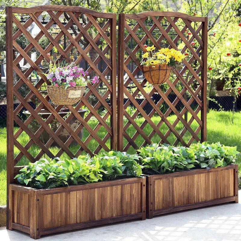 Antique pine wood raised free standing planter box for plants, placed on a balcony with a ladder and various plants inside.