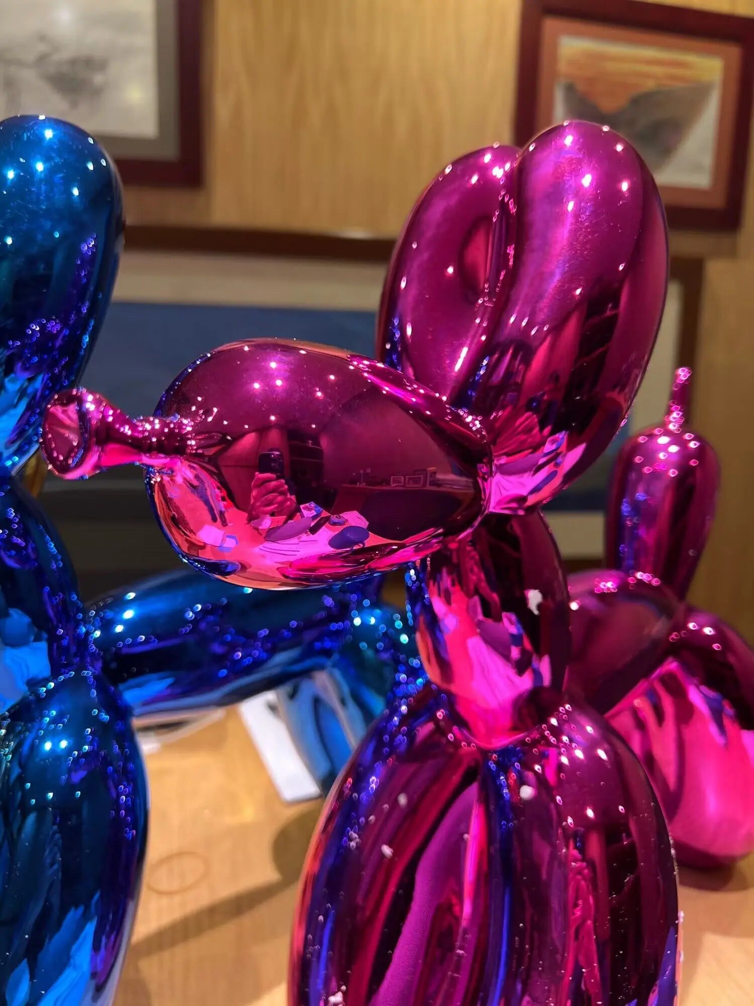 Modern art JONLALA balloon dog displayed on a shelf or table
