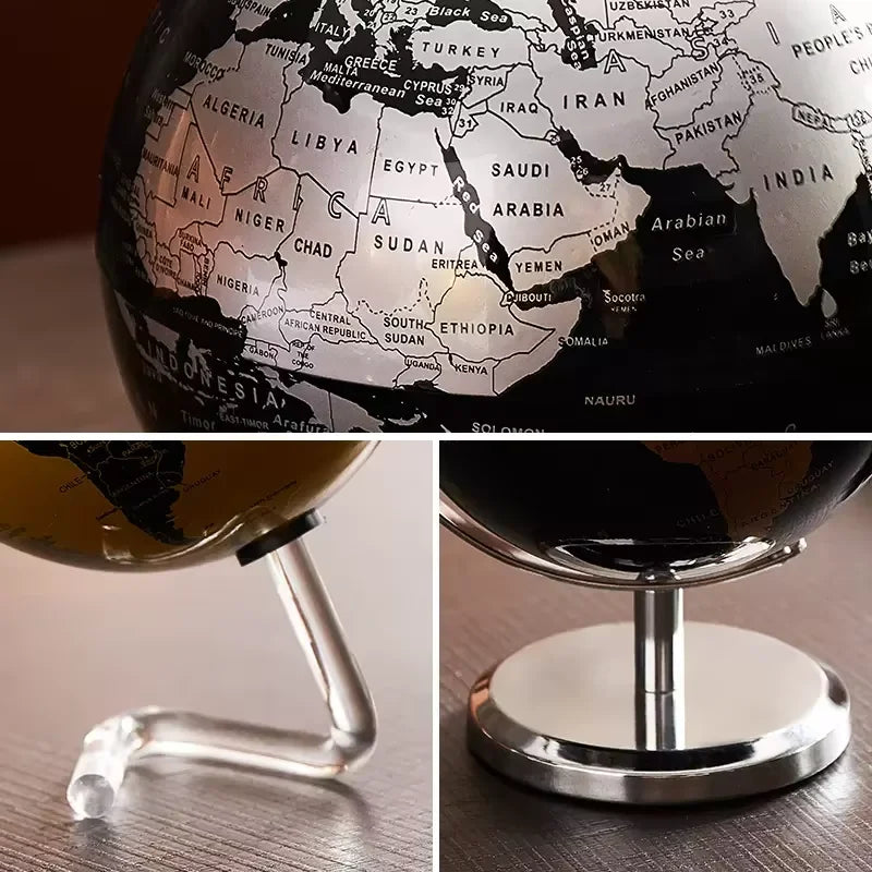 Globe with a detailed map of the world on a wooden surface