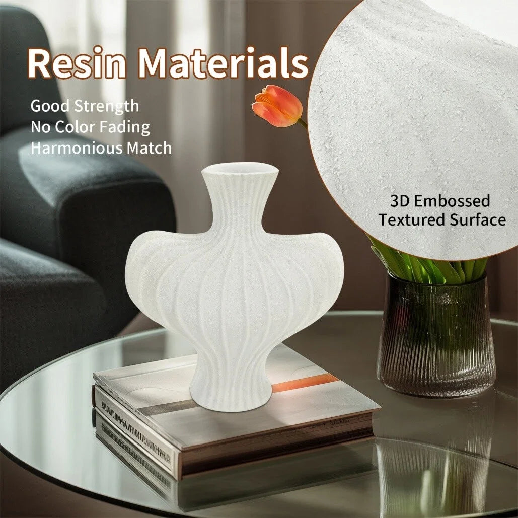 White textured vase and glass vase on a reflective surface with text about resin materials.