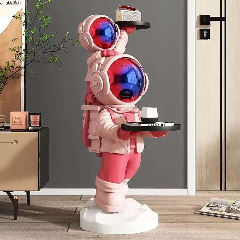 "Durable resin astronaut figurine in white and gold colors"