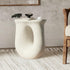 Off-white concrete end table with a minimalist design, fits modern home decor