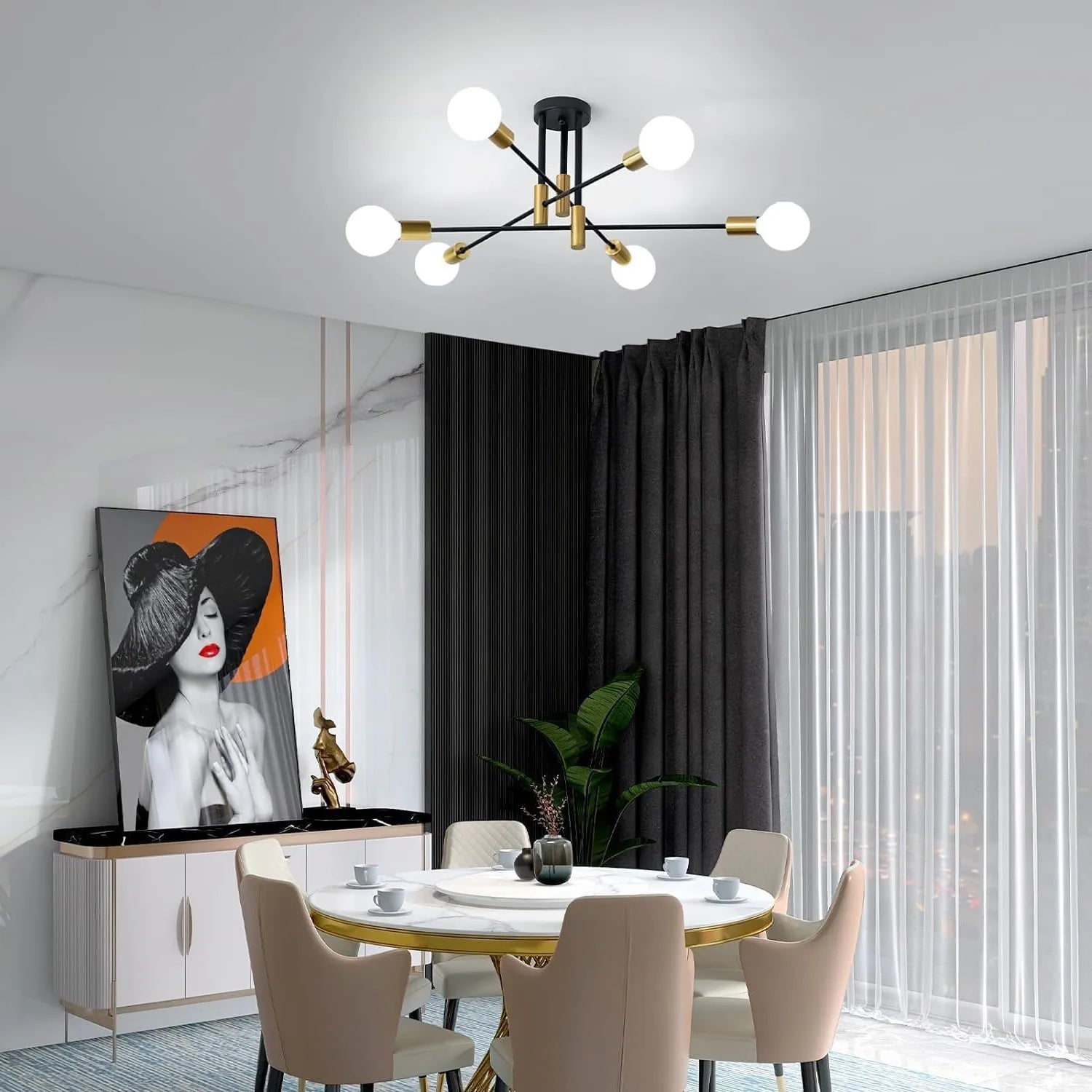 Modern dining room with a chandelier, table, chairs, and decorative elements.