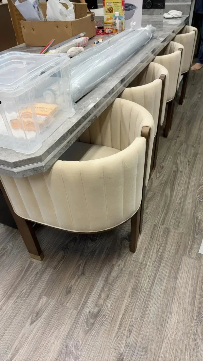 Durable solid wood dining chair with a comfortable and supportive fabric seat.