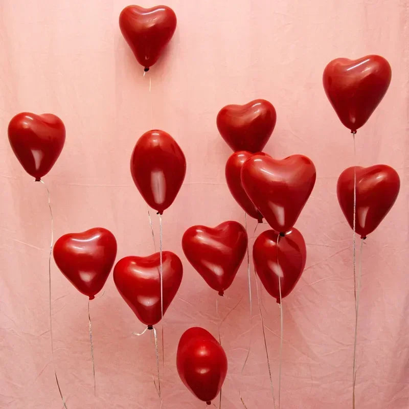 Pack of 50 red latex balloons, assorted shapes.