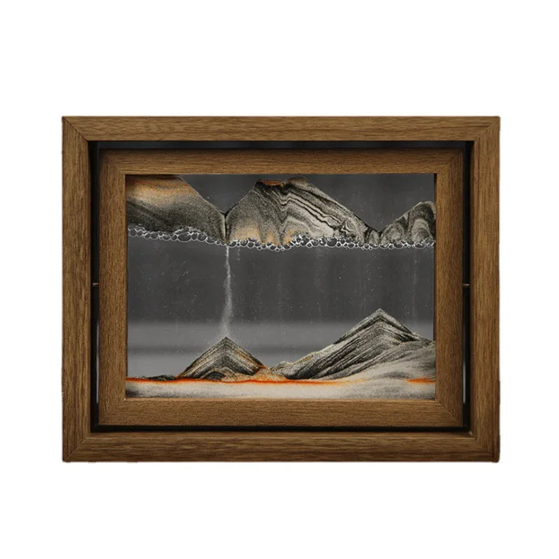 Framed artwork of a mountain landscape with a waterfall