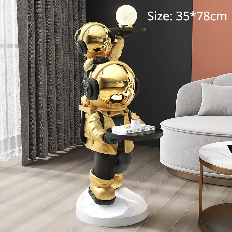 "Durable resin astronaut figurine in white and gold colors"