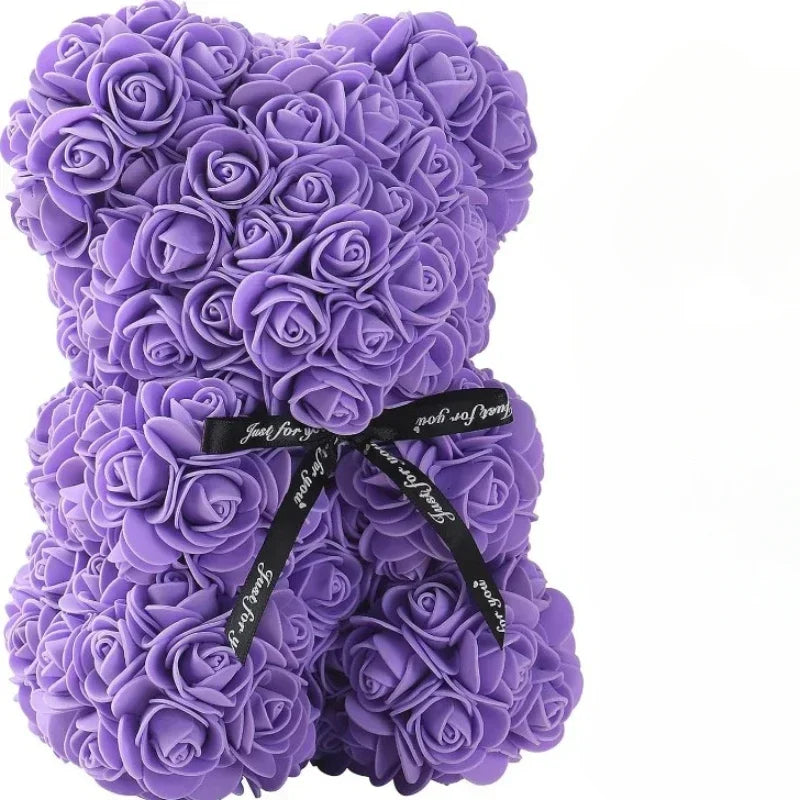 Charming teddy bear covered in preserved roses